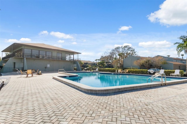 view of pool featuring a patio area