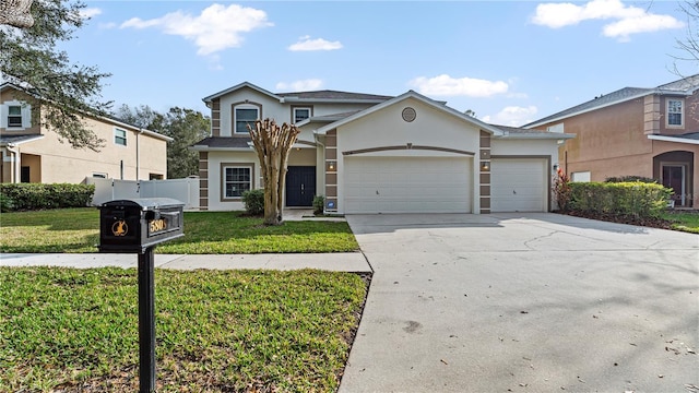 view of front property featuring a garage and a front lawn