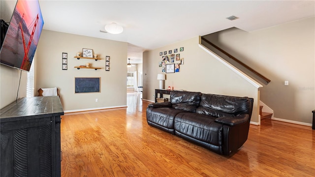 living room with hardwood / wood-style flooring