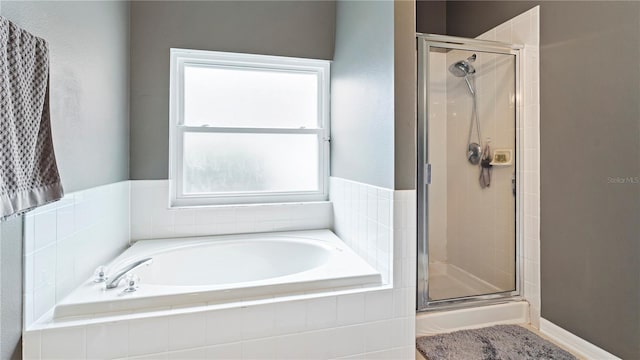 bathroom with independent shower and bath