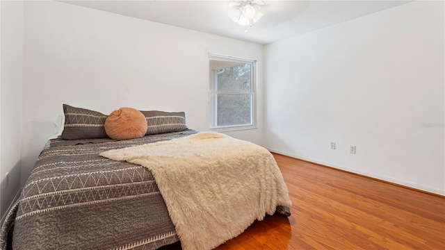 bedroom featuring hardwood / wood-style floors