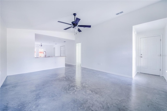 interior space with sink, vaulted ceiling, and ceiling fan