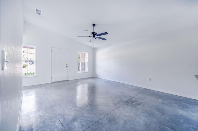 spare room with vaulted ceiling and ceiling fan