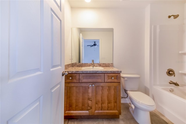 full bathroom featuring vanity, toilet, and washtub / shower combination