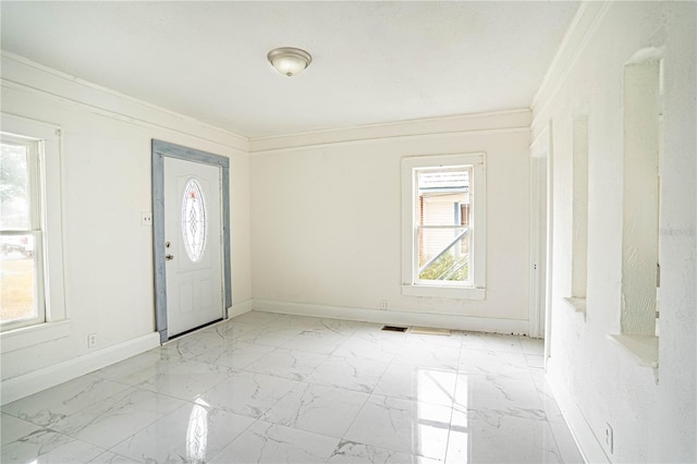 entrance foyer with crown molding