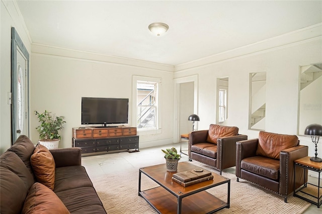 living room with crown molding and light tile patterned floors