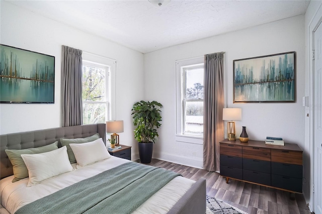 bedroom featuring dark hardwood / wood-style floors