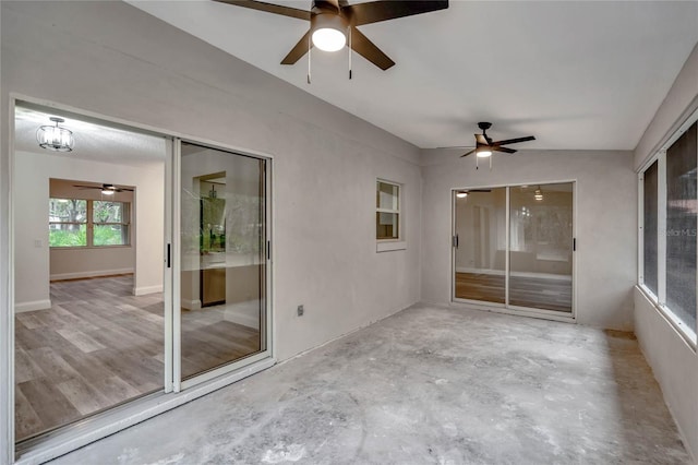 unfurnished sunroom with vaulted ceiling