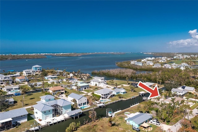 bird's eye view with a water view