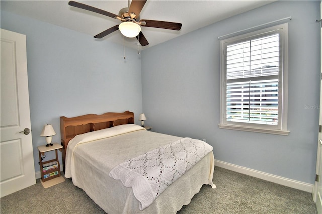 bedroom with ceiling fan and carpet