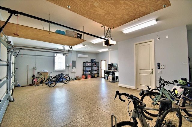 garage featuring a garage door opener and electric panel