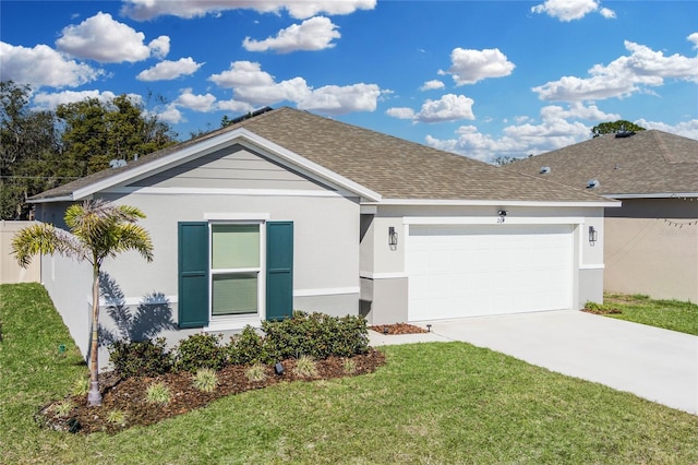 single story home featuring a garage and a front lawn