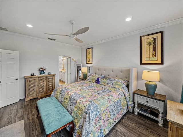 bedroom with crown molding, dark hardwood / wood-style floors, ceiling fan, and ensuite bathroom