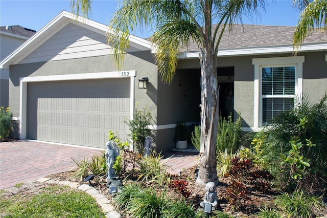 single story home with a garage