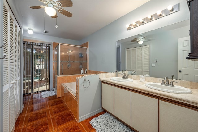 bathroom with vanity, tile patterned floors, plus walk in shower, and ceiling fan