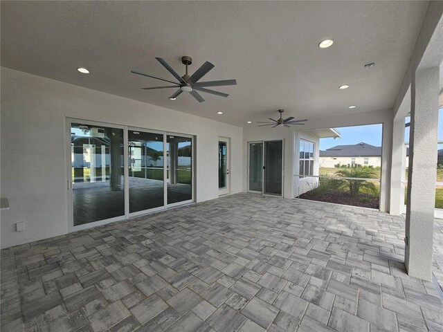 view of patio featuring a ceiling fan