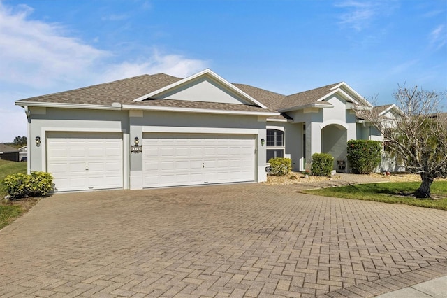 single story home with a garage