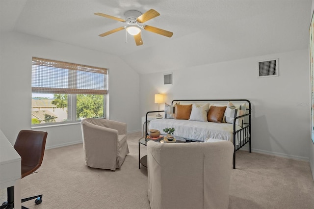 carpeted bedroom featuring vaulted ceiling and ceiling fan