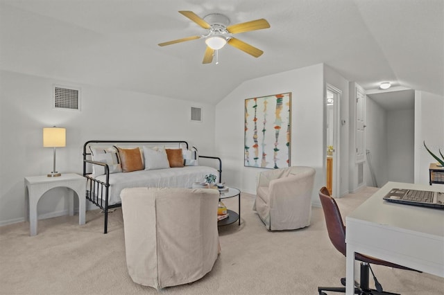 carpeted bedroom with vaulted ceiling and ceiling fan