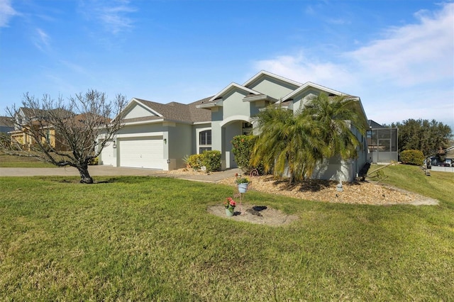 view of front of house featuring a garage, a lanai, and a front yard