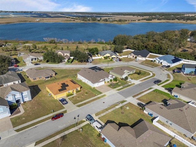 bird's eye view with a water view