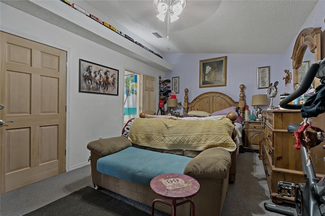 bedroom with ceiling fan, lofted ceiling, dark carpet, and a textured ceiling