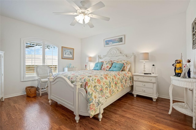 bedroom with ceiling fan and dark hardwood / wood-style flooring