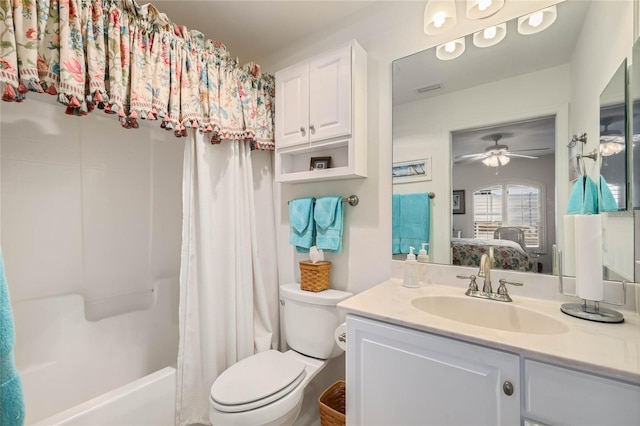 full bathroom with shower / tub combo, vanity, toilet, and ceiling fan