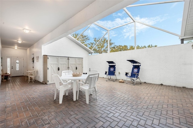 view of patio / terrace with glass enclosure