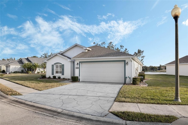 ranch-style home featuring a garage and a front lawn