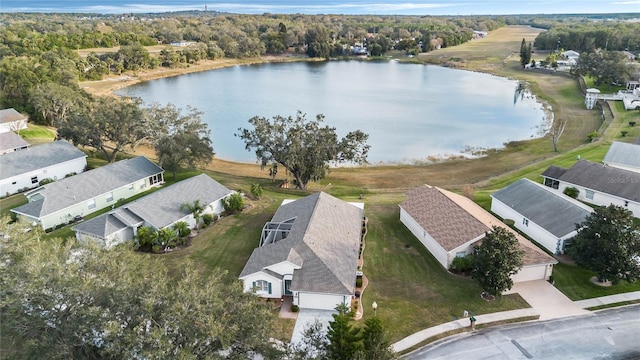 drone / aerial view with a water view