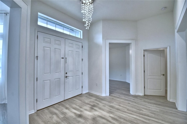 foyer with light hardwood / wood-style flooring