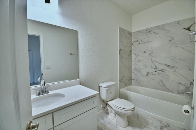 full bathroom with tiled shower / bath combo, vanity, and toilet