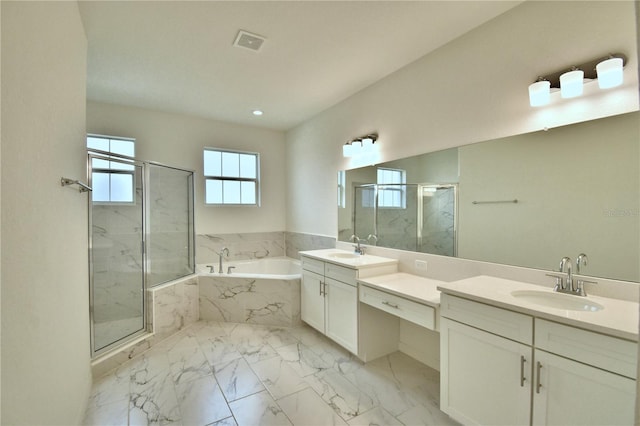 bathroom with shower with separate bathtub and vanity