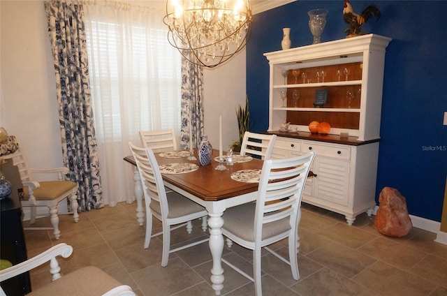 tiled dining space featuring a notable chandelier