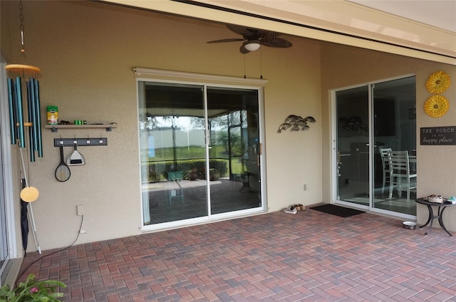 view of patio with ceiling fan