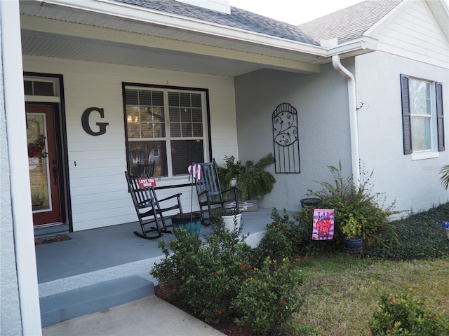 entrance to property with covered porch