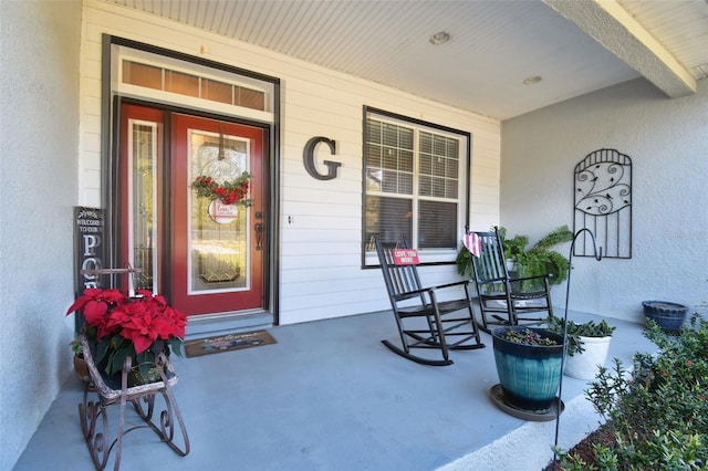 doorway to property featuring a porch