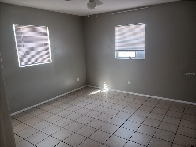 unfurnished room featuring ceiling fan