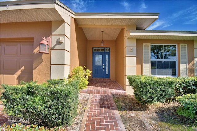 property entrance with a garage