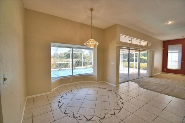 unfurnished room featuring light tile patterned flooring