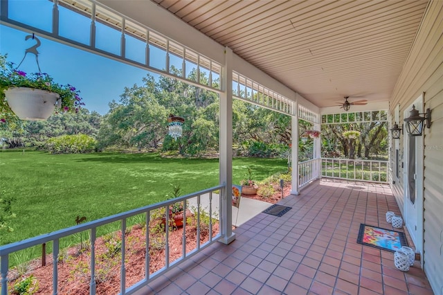 view of patio featuring ceiling fan and covered porch