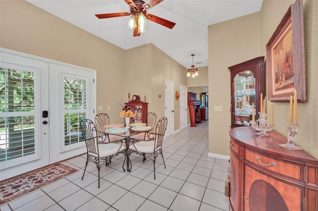 tiled dining area with french doors and ceiling fan