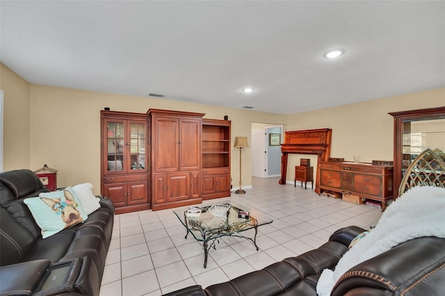 living room with light tile patterned flooring