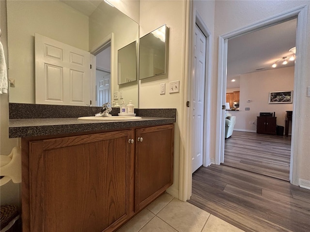 bathroom with vanity and tile patterned floors