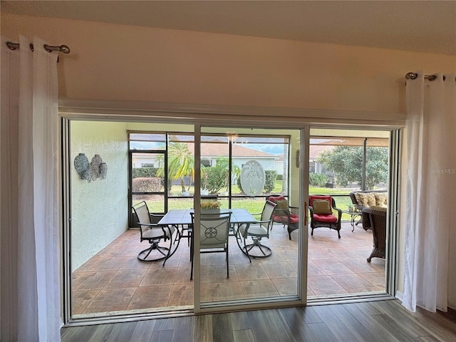 doorway to outside featuring hardwood / wood-style floors