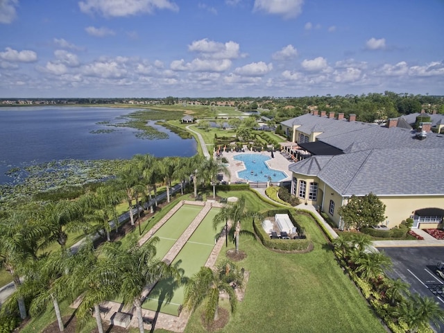 birds eye view of property with a water view