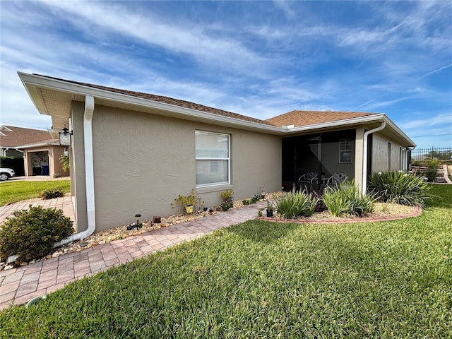 exterior space featuring a front lawn