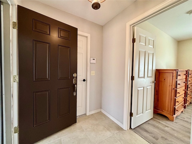 view of tiled foyer entrance