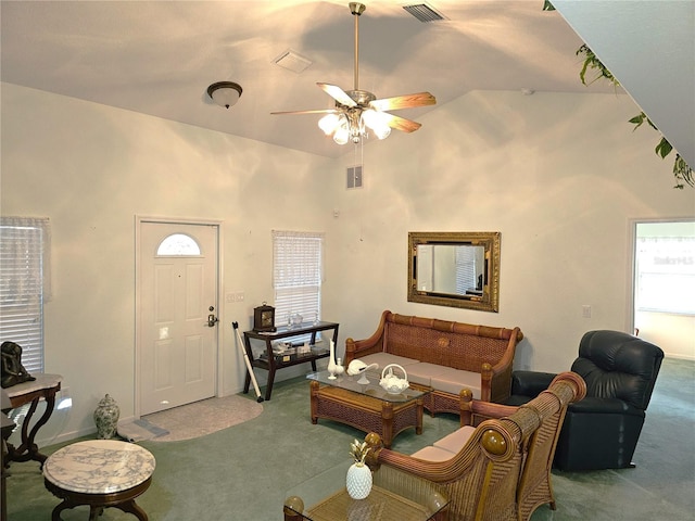 living room featuring ceiling fan, high vaulted ceiling, and carpet